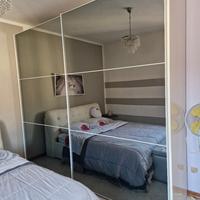 Armadio con ante scorevoli