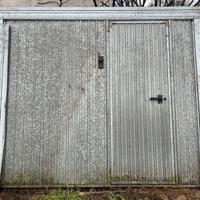 Portone basculante zincato con  contrappesi