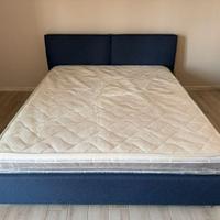 Letto contenitore con testata imbottita