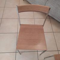 sedie in legno e acciaio