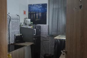 Stanza in appartamento a piano terra