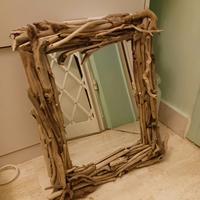 specchio con legni di mare