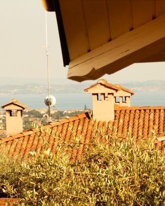 Appartamento con vista lago e posto auto privato