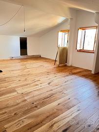 Parquet Rustico con Nodi e Screpi a Genova