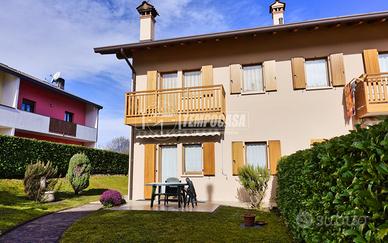 PORZIONE DI TESTA CON GIARDINO PRIVATO E VISTA DOL