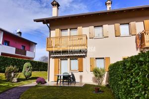 PORZIONE DI TESTA CON GIARDINO PRIVATO E VISTA DOL