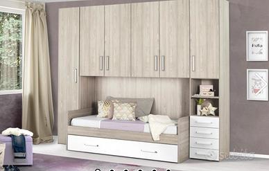 Cameretta 2 letti e 2 materassi compresi.