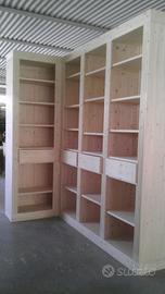 libreria in abete ad angolo ripiani cassetti segre