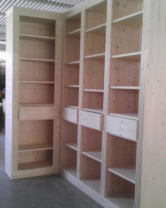 libreria in abete ad angolo ripiani cassetti segre