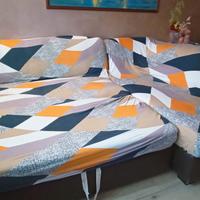 Divano a L con vano contenitore e panchetta estrai