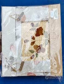 Album portafoto con fiori. 