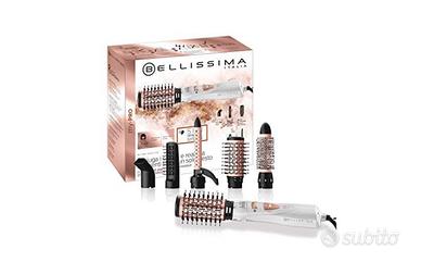 N U O V O.  Piastra/arriccia capelli/modellatore