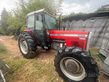 Trattore Massey ferguson 399 con aratro