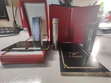 2 accendini argento Cartier + 1 Saffa 