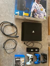 Ps4 Pro 1TB + Giochi + Base ricaricabile