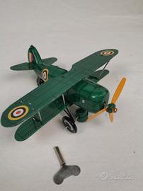 biplano neo vintage di latta a molla