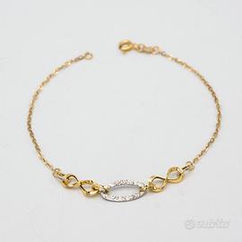 Bracciale oro giallo bianco 9kt con centrale S.10
