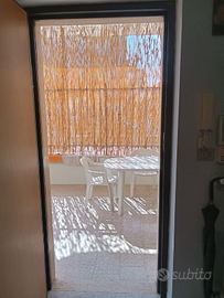 Monolocale arredato con veranda al mare