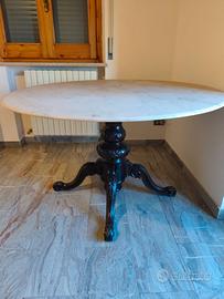 Tavolo rotondo con piano intercambiabile