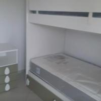 Letto a castello con scala contenitore laterale