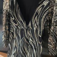 Vestito luminoso paillettes