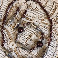 Parure collana, braccialetto e orecchini