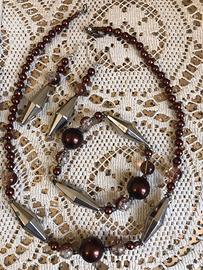 Parure collana, braccialetto e orecchini