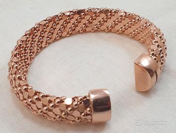 Bracciale rosa in bronzo a molla