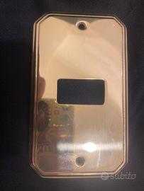 Placche interruttori ottone