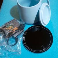 RIBASSO Tazza con base per tenerla calda.