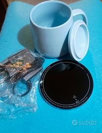 RIBASSO Tazza con base per tenerla calda.