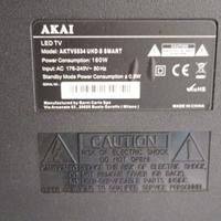 TV Akai con pannello danneggiato