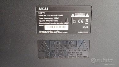 TV Akai con pannello danneggiato