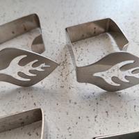 Accessorio tovaglia set 4 pezzi acciaio forma fogl