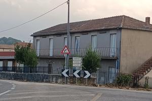 Abitazione e locale commerciale