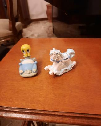 Titti in automobile e cavalluccio  a dondolo