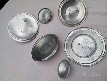 Coperchi in alluminio con manico in bachelite