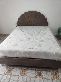 letto matrimoniale con materasso nuovo