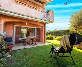 PALAU - ELEGANTE TRILOCALE CON GIARDINO PRIVATO