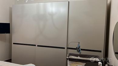 camera da letto-divano-tavolo