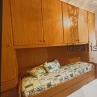 armadio a ponte con doppio letto