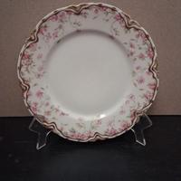 Serie di 4 piatti dolce in porcellana decorata