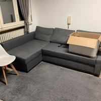 Divano letto angolare grigio