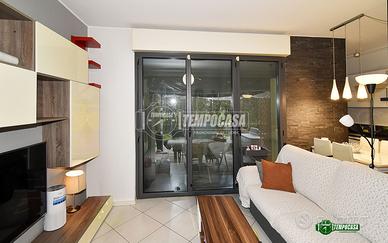 SPLENDIDO BILOCALE CON GIARDINO PRIVATO