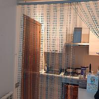 Tendina con fili di plastica