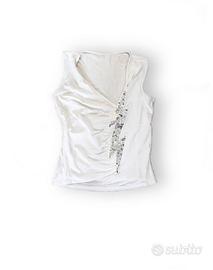 Top bianco smanicato con paillettes argento