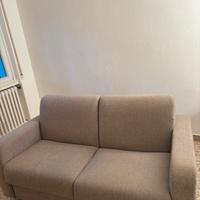 Divano letto grigio moderno