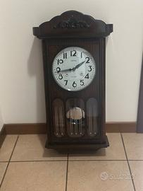 Orologio a pendolo da parete