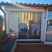 Tenda a rullo motorizzata in cristal