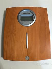 Bilancia pesa persona